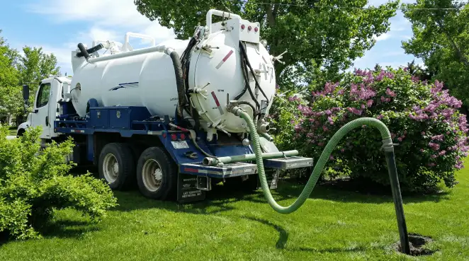 Professional vacuum truck performing residential drainage and septic maintenance in Scottsdale, AZ